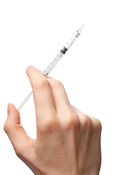 Female hand with syringe — Stock Photo, Image