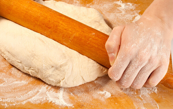 Rolling the dough with hands