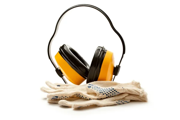 Écouteurs et gants de travail — Photo