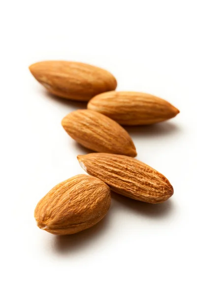 Almonds on the white background — Stock Photo, Image