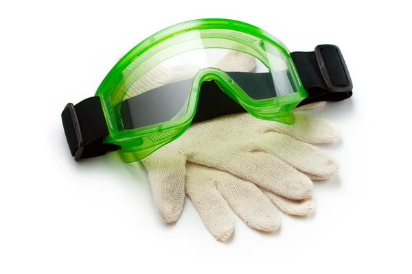 Зеленые очки с защитными перчатками — стоковое фото