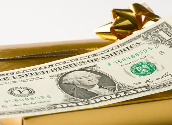 Dollar and gift — Stock Photo, Image