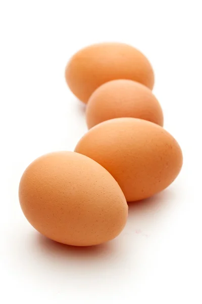 Huevos en el fondo blanco — Foto de Stock