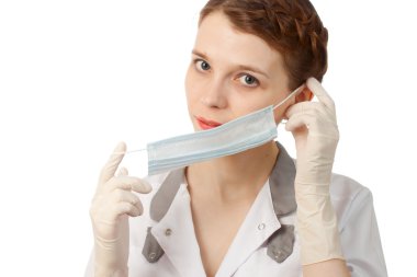 Nurse putting on medical mask clipart