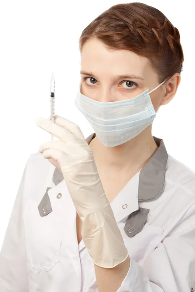 Sjuksköterska i sterila handskar och medicinska mask — Stockfoto