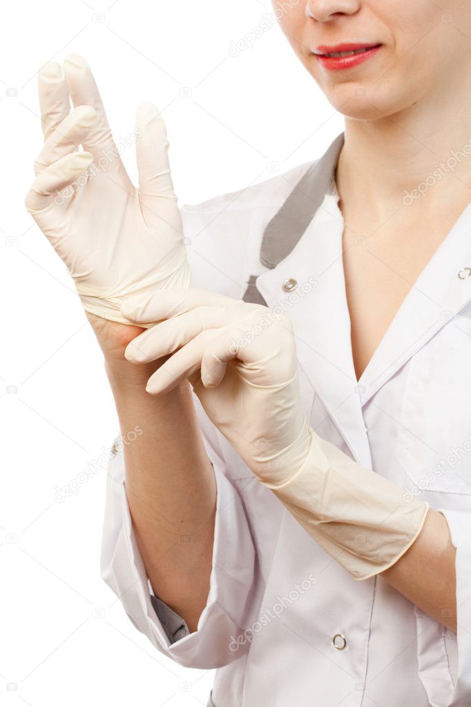 Sygeplejerske sætte på handsker — Stock-foto ©