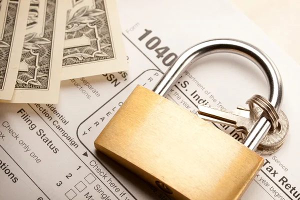 Tax form, dollars and key lock — Stock Photo, Image