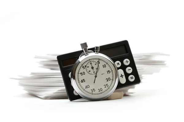 Pile de cartes papier, calculatrice et chronomètre — Photo