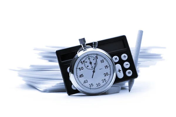Pile of paper cards, calculator and stopwatch — Stock Photo, Image