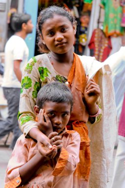 Two children begging clipart