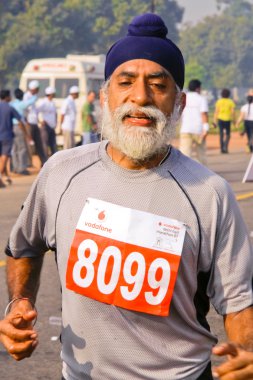 Elderly male marathon runner clipart