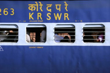 Train at railway station, mumbai, india clipart