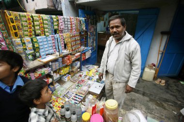 Scene at candy shop, delhi, india clipart