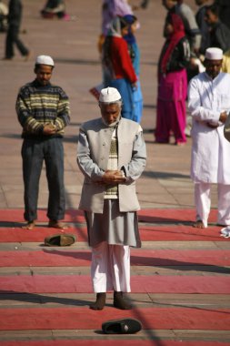 dua zamanı adamlara jama Mescidi, delhi, Hindistan