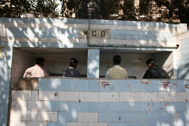 Public urinals in delhi, india clipart