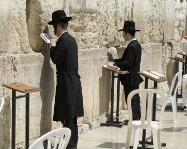 Jewish men praying at the wailing wall, jerusalem, israel clipart