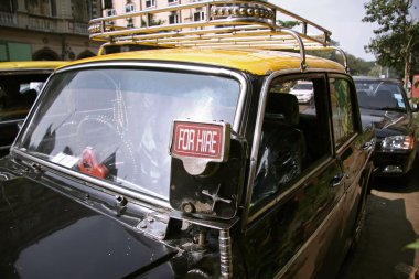 Taxi awaiting passenger, mumbai, india clipart