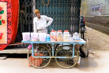 Male street vendor clipart