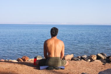 Man meditating clipart