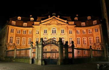 Old mansion illuminated, munster, germany clipart