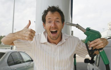 Man at petrol pump clipart