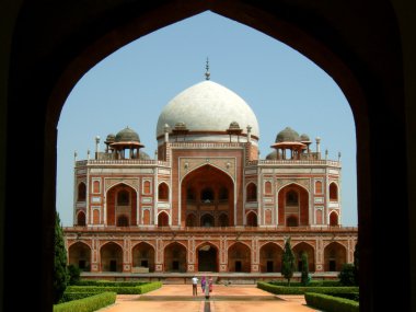 Front view of the humayun tomb framed by the fort wall entrance clipart