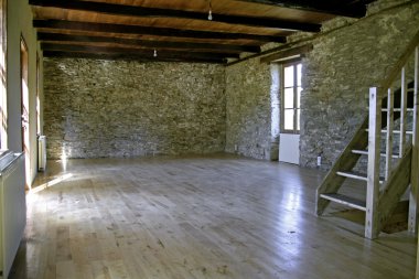 Empty stone house after renovation clipart