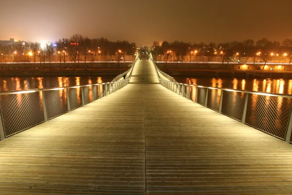 Simon de beauvoir gångbron på natten, paris, Frankrike — Stockfoto
