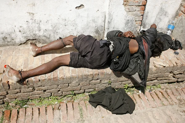 Sleeping beggar — Stock Photo, Image