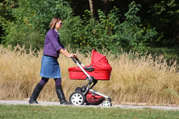 Mother and pram — Stock Photo, Image
