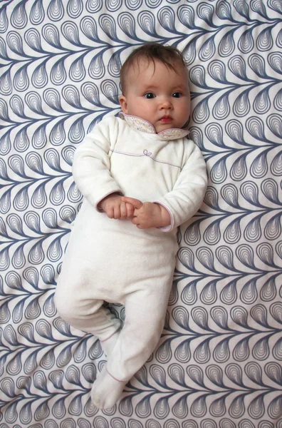 Baby on pattern background — Stock Photo, Image