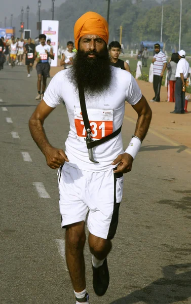Sikh man op de marathon van delhi, india — Stockfoto