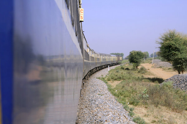 Train ride through the countryside, india