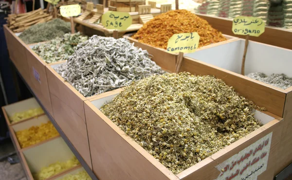 stock image Camomile and other herbs and spices on display