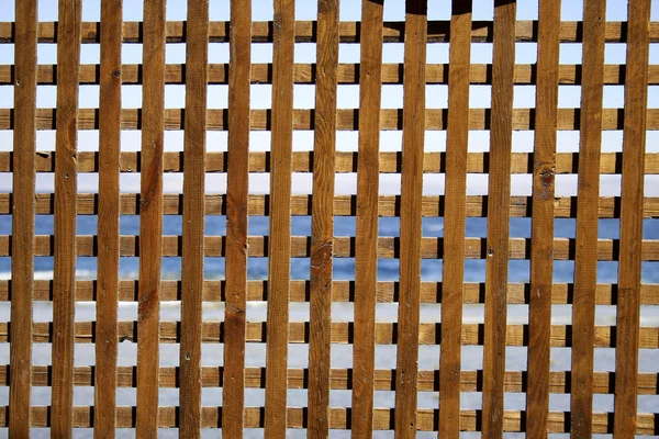 Padrão de cerca de madeira no fundo do mar vermelho, sinai, egito — Fotografia de Stock