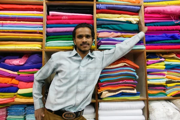 Samec obchodník fabric — Stock fotografie