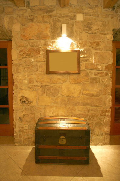 Treasure chest and wall painting in villa interior