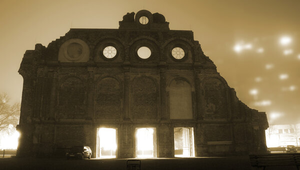 Anhalter bahnhof at nightin the mist, berlin, germany