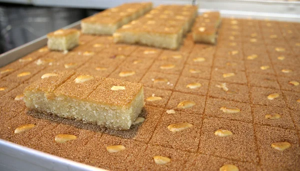 Stock image Close up of arab cake on display in market