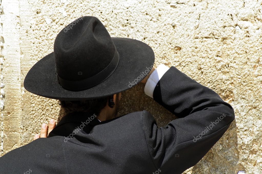 Hasidic jews at the wailing western wall, jerusalem, israel