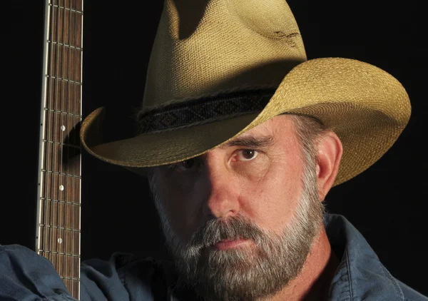 A Cowboy with a Gray Beard and a Guitar — Stock Photo, Image