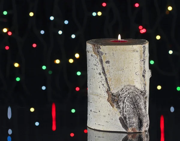 En aspen logga ljus och jul ljus — Stockfoto