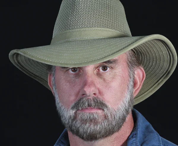 Safari şapka içinde sakallı bir adam — Stok fotoğraf