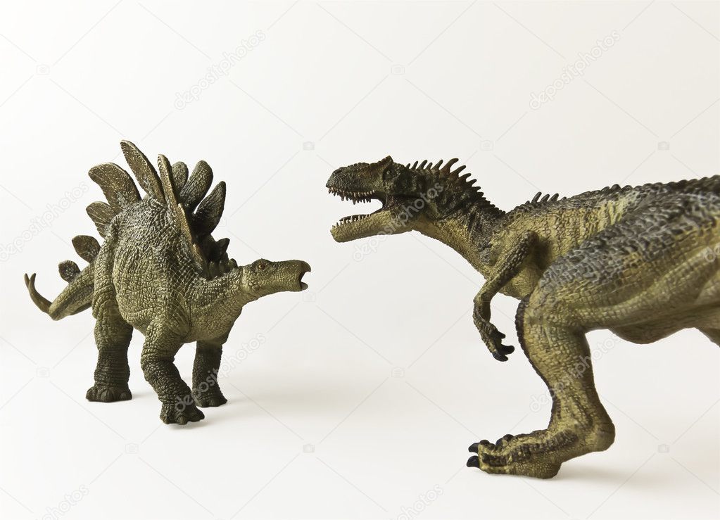A Stegosaurus and Allosaurus Against a White Background
