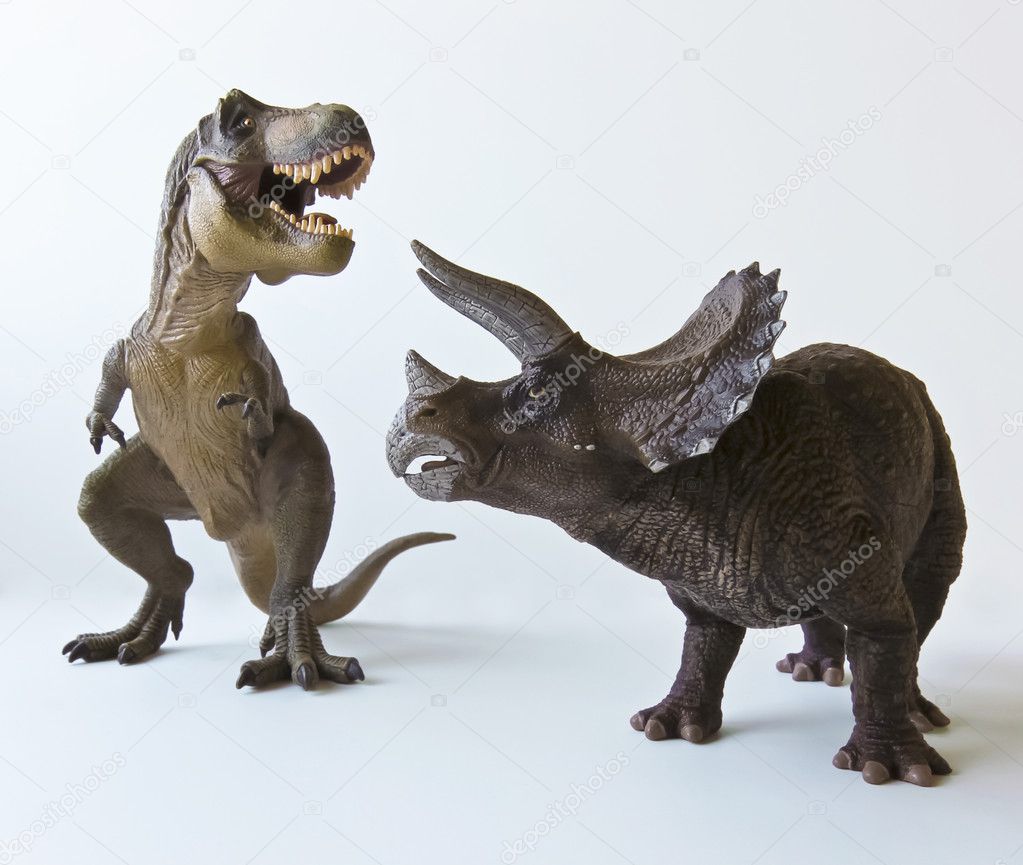A Triceratops and Tyrannosaurus Against a White Background