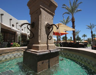 A Fountain at a Health Resort Hotel clipart