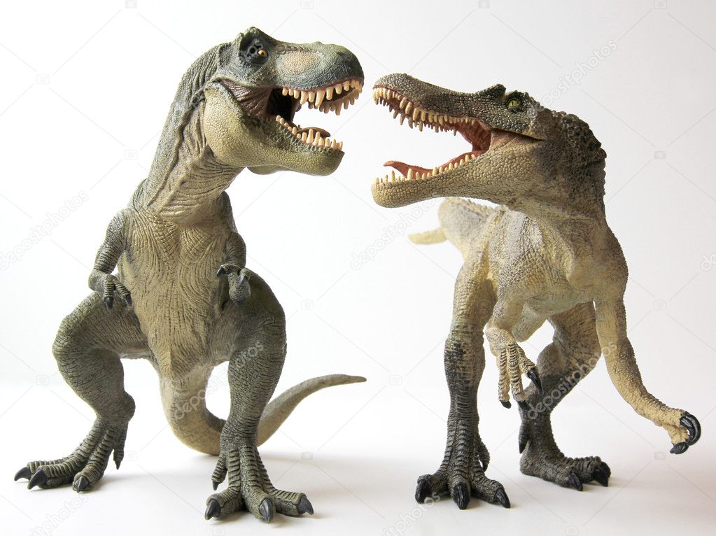 A Tyrannosaurus Rex Dinosaur Battles a Spinosaurus