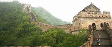 A Man Photographs a Woman on the Great Wall of China clipart