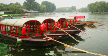 A Group of Five Red Boats, Qian Hai Lake, Beijing clipart