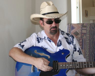 A Man with a Blue Electric Guitar clipart